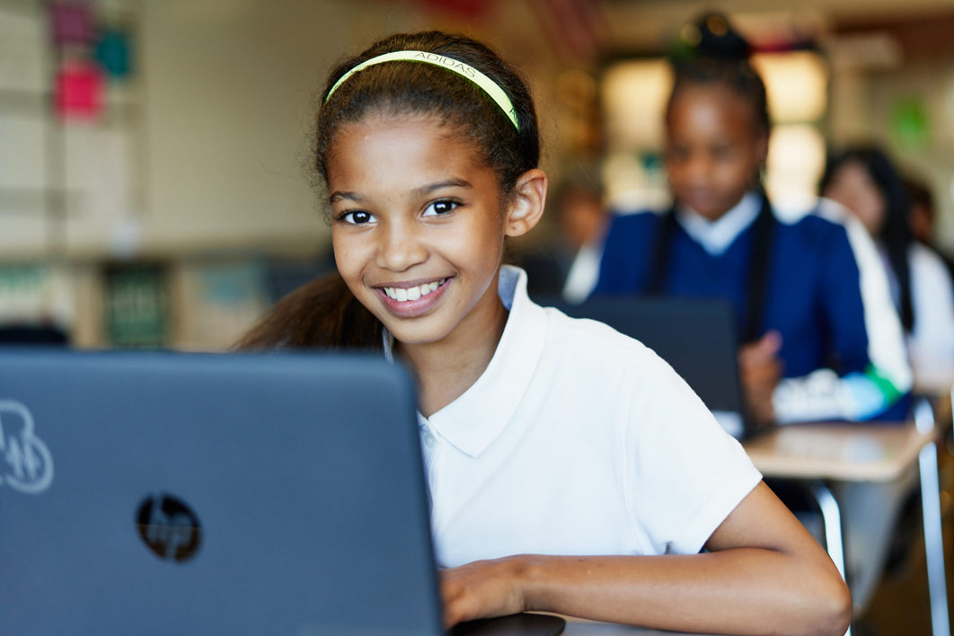 A young student explores Khan Academy, a free, online platform for education