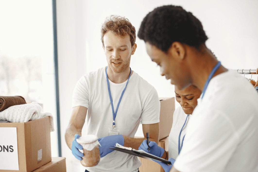 Relief agency workers pack supplies for disaster-affected communities